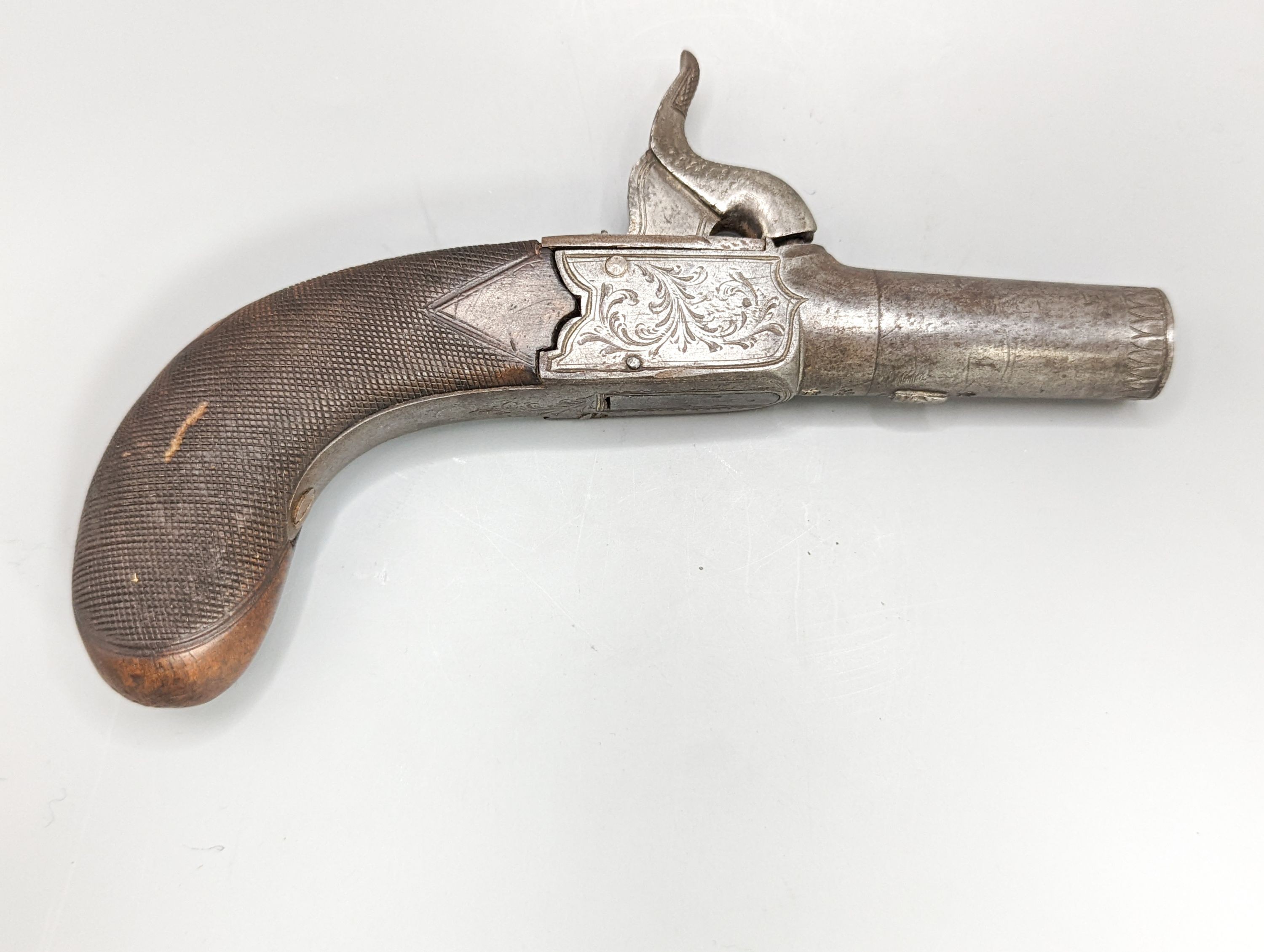A 19th century pocket pistol, engraved makers mark G and J Deane London, 15.5 cm
